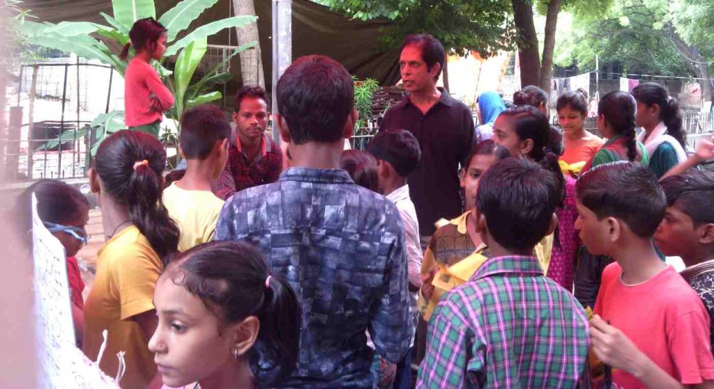 RMN Foundation founder Rakesh Raman running an education campaign with the help of student volunteers in New Delhi, India. Photo: RMN News Service